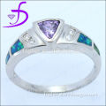 exclusive blue fire opal ring with amethyst CZ